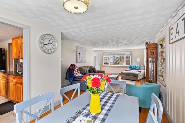 dining room with baseboards