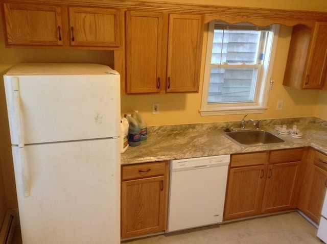 kitchen featuring sink and white appliances