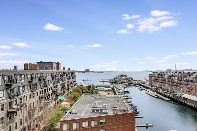 bird's eye view featuring a view of city and a water view