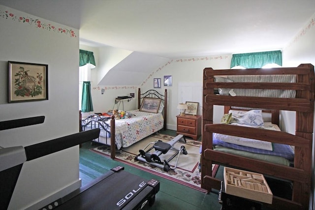 bedroom featuring vaulted ceiling