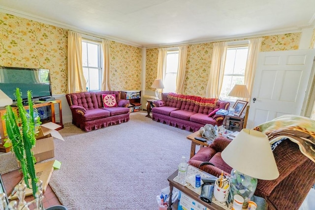 living area with crown molding, plenty of natural light, and wallpapered walls