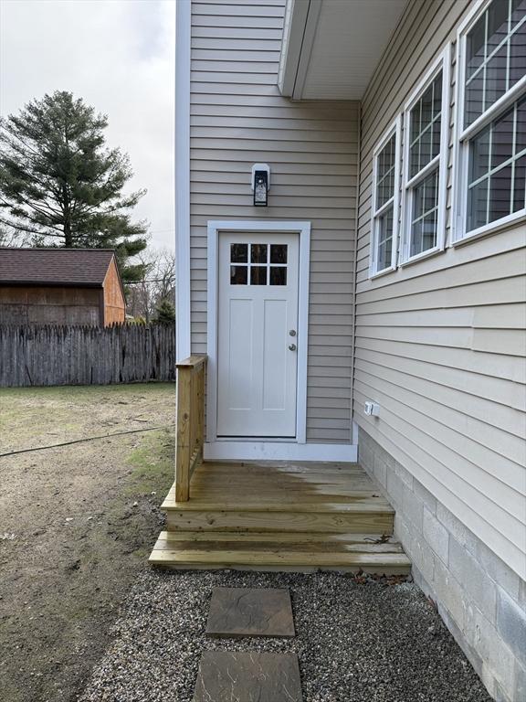 property entrance featuring fence