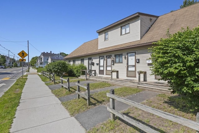 516 High St Unit 516, Clinton, MA 01510 - view of front facade with roof with shingles