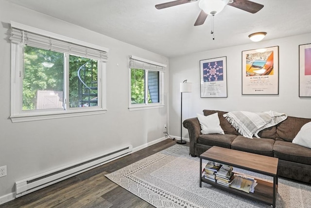 516 High St Unit 516, Clinton, MA 01510 - living area with a baseboard radiator, wood finished floors, ceiling fan, and baseboards