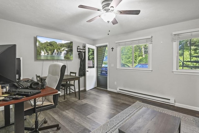 516 High St Unit 516, Clinton, MA 01510 - home office featuring a baseboard heating unit, wood finished floors, a ceiling fan, and baseboards