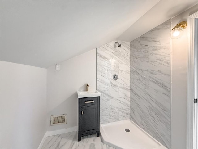 bathroom featuring baseboards, a stall shower, marble finish floor, and visible vents