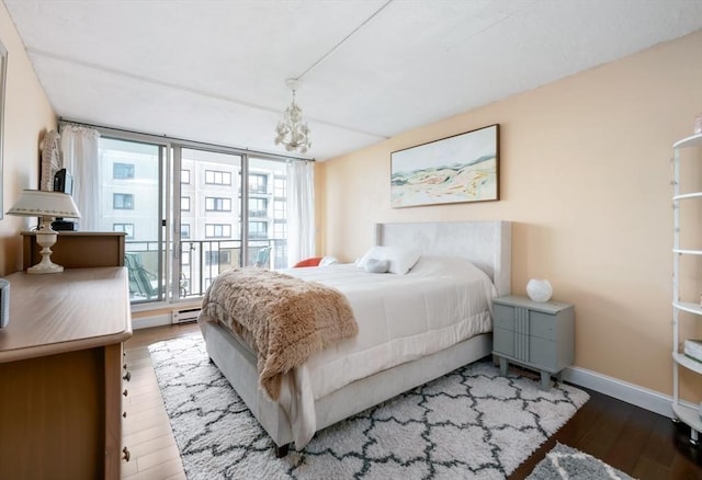 73 Broad Reach Unit T111C, Weymouth, MA 02191 - bedroom with wood finished floors and baseboard heating