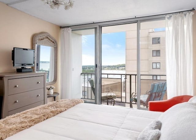 73 Broad Reach Unit T111C, Weymouth, MA 02191 - bedroom with access to outside, a water view, and a wall of windows