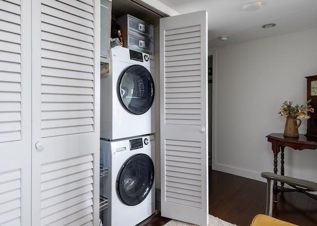 73 Broad Reach Unit T111C, Weymouth, MA 02191 - laundry room with stacked washer and clothes dryer and wood finished floors