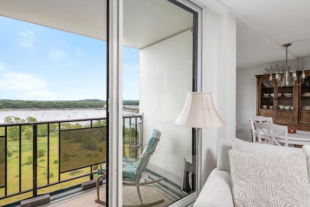 73 Broad Reach Unit T111C, Weymouth, MA 02191 - sunroom with a water view and a chandelier