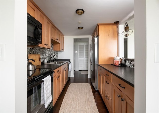 73 Broad Reach Unit T111C, Weymouth, MA 02191 - kitchen featuring black appliances, dark countertops, backsplash, and dark wood-type flooring