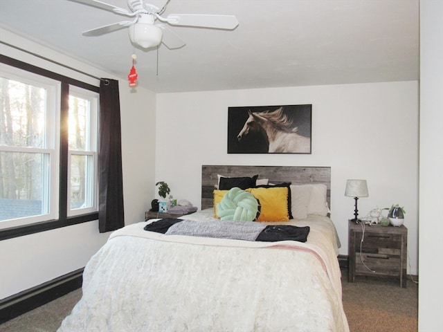 bedroom with carpet flooring, ceiling fan, and multiple windows