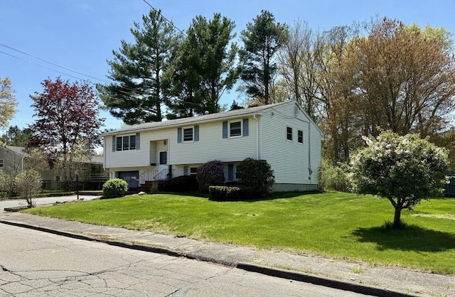 4 Fernandez Cir, Randolph, MA 02368 - split foyer home with a front lawn