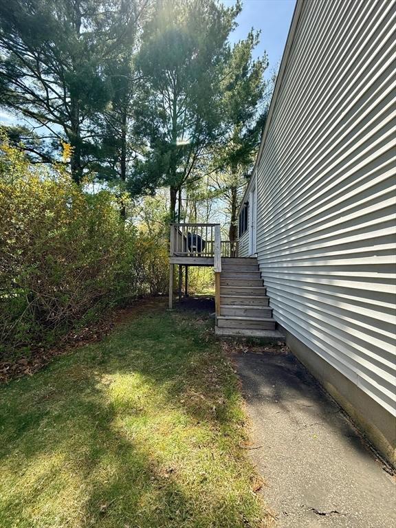 4 Fernandez Cir, Randolph, MA 02368 - view of yard featuring stairs and a wooden deck