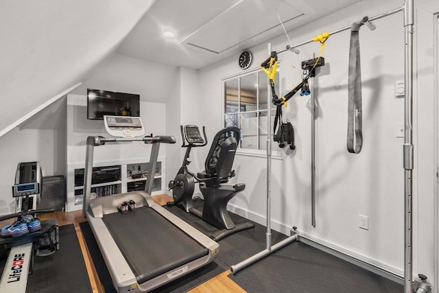 workout area featuring lofted ceiling