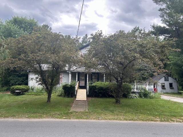 299 S Precinct St, Taunton, MA 02718 - obstructed view of property featuring a front lawn