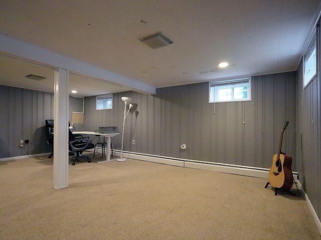 347 Lexington St, Woburn, MA 01801 - below grade area featuring carpet floors, wood walls, a desk, and baseboards
