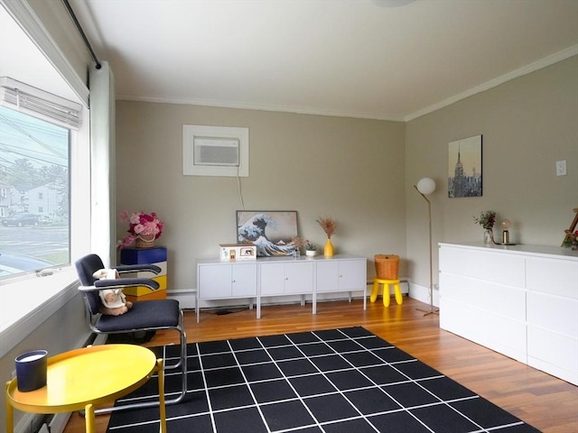 347 Lexington St, Woburn, MA 01801 - sitting room featuring wood finished floors and crown molding