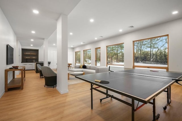 playroom featuring light wood-type flooring