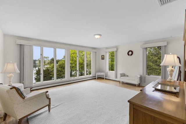 376 Flint St, Barnstable, MA 02648 - office with wood finished floors and a baseboard heating unit