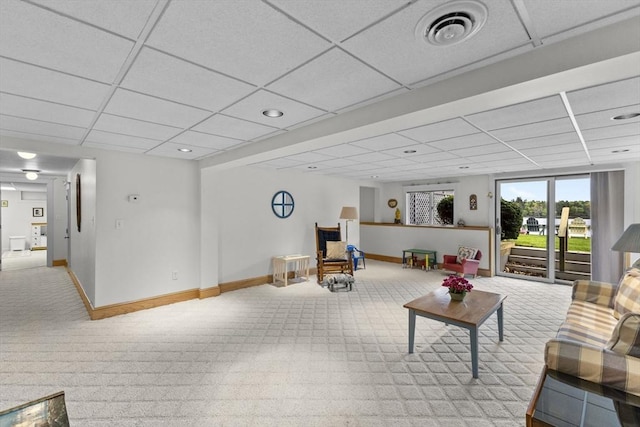 376 Flint St, Barnstable, MA 02648 - living area featuring a drop ceiling, light colored carpet, and baseboards