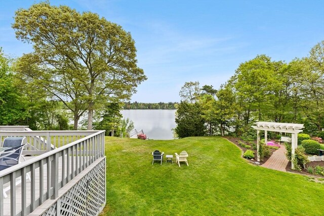 376 Flint St, Barnstable, MA 02648 - view of grassy yard with a pergola and a water view