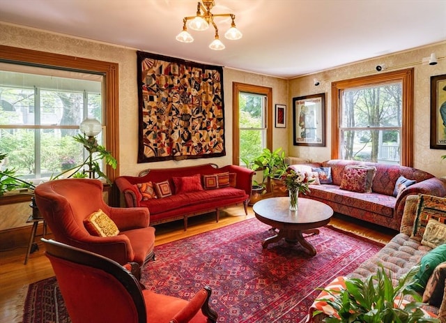 living area featuring plenty of natural light and wood finished floors