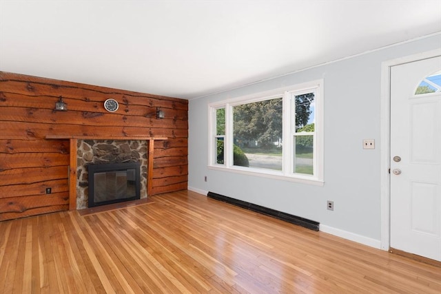 25 Watson St, Seekonk, MA 02771 - unfurnished living room featuring plenty of natural light, light wood-style flooring, and a fireplace