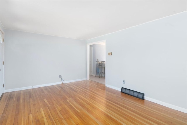 25 Watson St, Seekonk, MA 02771 - unfurnished room with baseboards and light wood-type flooring