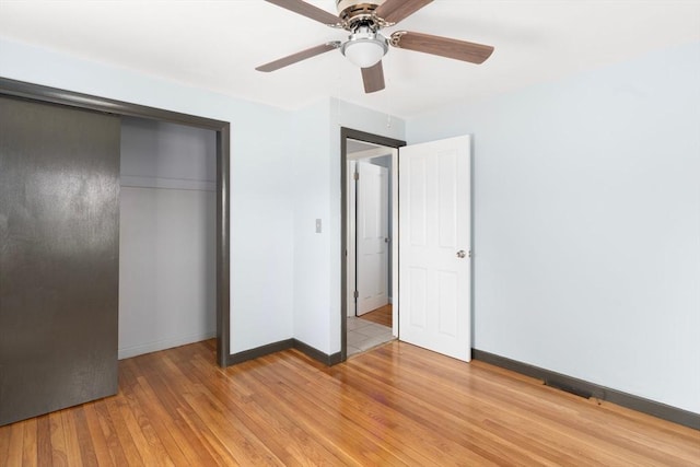 25 Watson St, Seekonk, MA 02771 - unfurnished bedroom featuring light wood finished floors, baseboards, a closet, and a ceiling fan