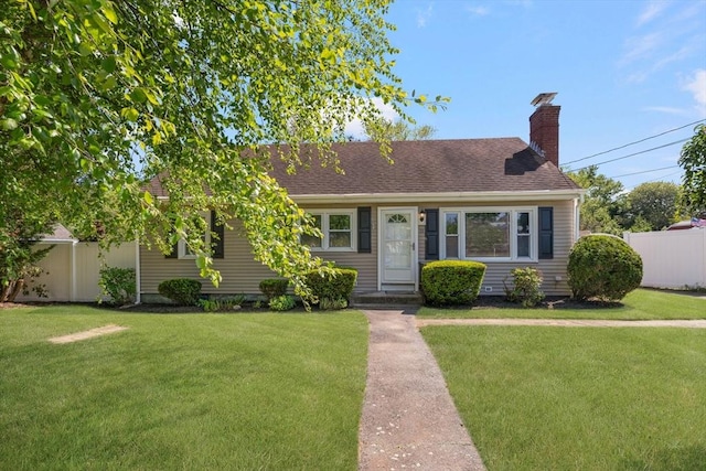 25 Watson St, Seekonk, MA 02771 - view of front of home with a chimney and a shingled roof