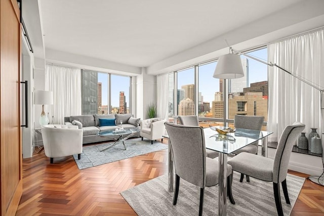 sunroom / solarium featuring a view of city