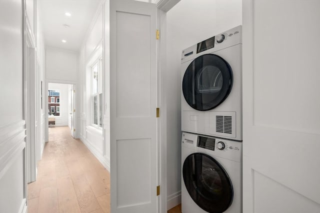 9 Russell Unit 2, Boston, MA 02129 - laundry area featuring estacked washer and dryer, light wood-style floors, and recessed lighting