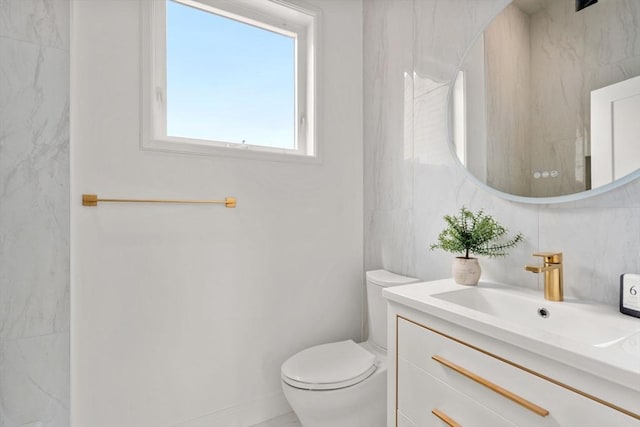 9 Russell Unit 2, Boston, MA 02129 - bathroom with toilet, vanity, and tile walls