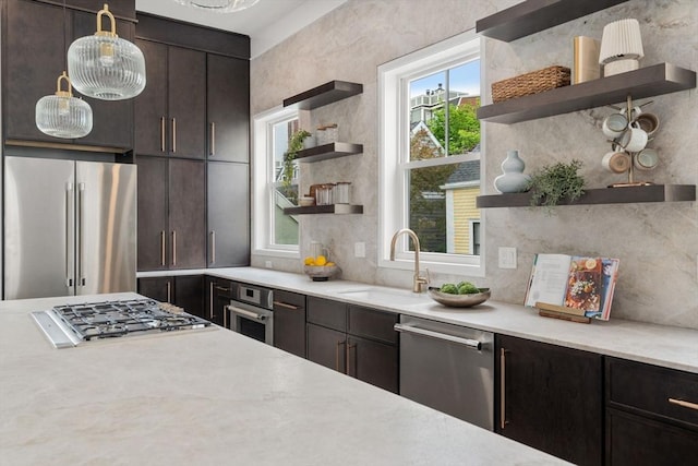 9 Russell Unit 2, Boston, MA 02129 - kitchen featuring open shelves, stainless steel appliances, a sink, and light countertops