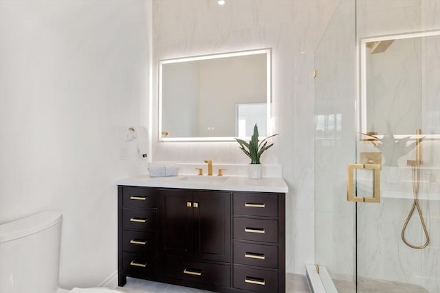 9 Russell Unit 2, Boston, MA 02129 - full bath featuring vanity, a marble finish shower, and toilet