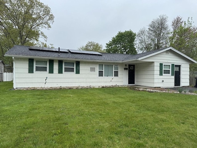 11 Marie Ave, Brockton, MA 02302 - ranch-style home featuring a front lawn, roof mounted solar panels, and a shingled roof