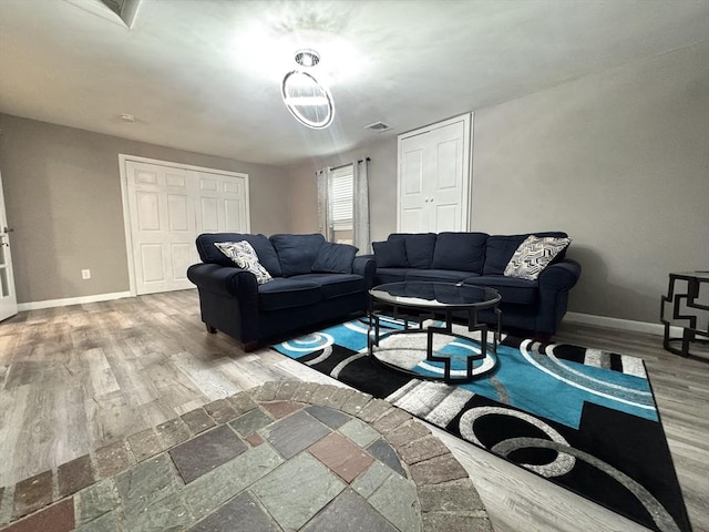 11 Marie Ave, Brockton, MA 02302 - living room with baseboards and wood finished floors