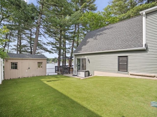 34 Lake Shore Dr S, Westford, MA 01886 - view of grassy yard with an outbuilding and a pergola