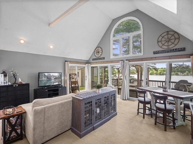 34 Lake Shore Dr S, Westford, MA 01886 - living area with high vaulted ceiling, light colored carpet, and recessed lighting