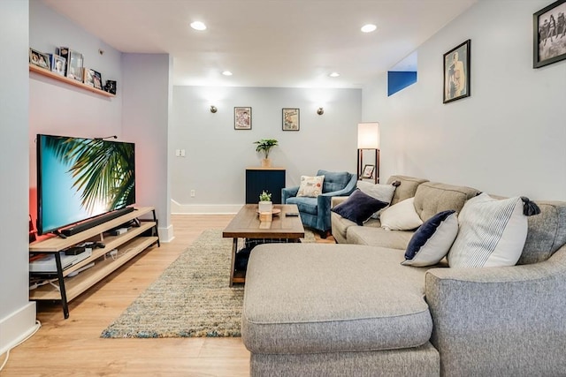 living room with light hardwood / wood-style floors