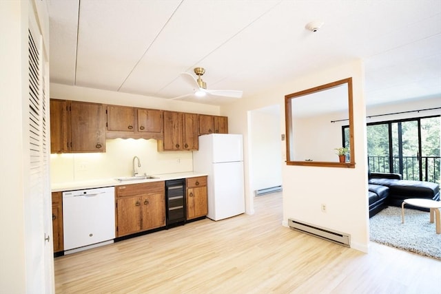 235 Winthrop St Unit 4407, Medford, MA 02155 - kitchen featuring white appliances, wine cooler, baseboard heating, light wood-style flooring, and light countertops