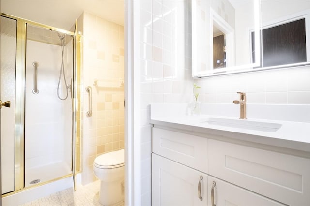 235 Winthrop St Unit 4407, Medford, MA 02155 - bathroom with vanity, a shower stall, tile walls, and tile patterned flooring