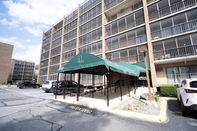 235 Winthrop St Unit 4407, Medford, MA 02155 - view of apartment building / complex featuring uncovered parking