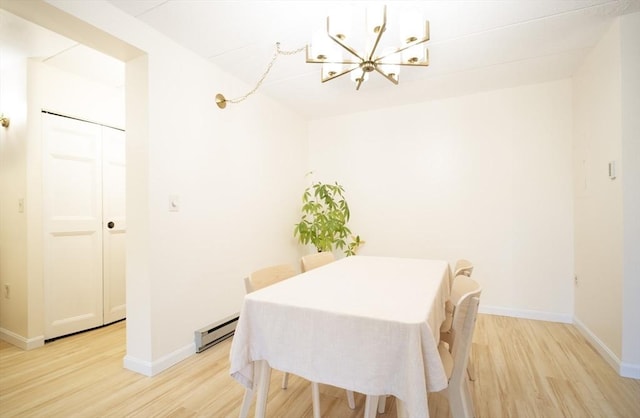 235 Winthrop St Unit 4407, Medford, MA 02155 - dining room featuring a chandelier, light wood finished floors, and a baseboard radiator