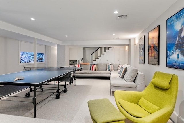 recreation room featuring carpet flooring