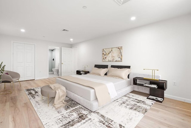 64 Willard St Unit 408, Quincy, MA 02169 - bedroom featuring light wood finished floors, recessed lighting, and ensuite bathroom