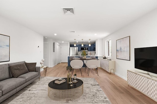 64 Willard St Unit 408, Quincy, MA 02169 - living room featuring light wood-style floors and recessed lighting