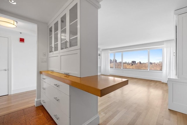 bar featuring recessed lighting and baseboards