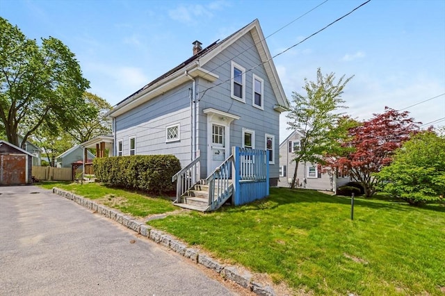 28 Sterling St, Weymouth, MA 02188 - view of front of property with a chimney